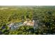 Aerial view of a new housing development near a pond and lush forest at 505 Yukon Ct, Summerville, SC 29485
