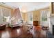Cozy bedroom with hardwood floors and a charming canopy bed at 366 Avenue Of Oaks, Moncks Corner, SC 29461