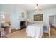 Elegant dining room featuring a fireplace, chandelier, and antique tapestry at 366 Avenue Of Oaks, Moncks Corner, SC 29461