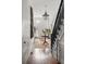 Long hallway with hardwood floors, a chandelier, and a grand staircase at 366 Avenue Of Oaks, Moncks Corner, SC 29461