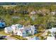 Luxury waterfront home nestled amongst other upscale properties at 9004 Topwater Ln, Johns Island, SC 29455