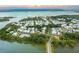 Drone view of a charming coastal neighborhood featuring waterfront properties at 9004 Topwater Ln, Johns Island, SC 29455