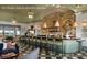 Upscale resort bar with green barstools, unique lighting, and a stylish design at 9004 Topwater Ln, Johns Island, SC 29455