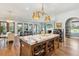 Gourmet kitchen boasts a marble island, custom cabinetry, and high-end appliances at 9004 Topwater Ln, Johns Island, SC 29455