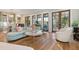 Relaxing living room with French doors and hardwood floors at 9004 Topwater Ln, Johns Island, SC 29455