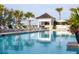 Resort style pool with lounge chairs, umbrellas and gazebo at 9004 Topwater Ln, Johns Island, SC 29455