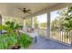 Peaceful screened porch overlooks tranquil marsh views at 9004 Topwater Ln, Johns Island, SC 29455