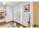 Hardwood floor entryway with white door and sidelights at 105 Queensbury Cir, Goose Creek, SC 29445