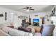 Relaxing living room featuring a fireplace and large TV at 105 Queensbury Cir, Goose Creek, SC 29445