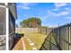 Landscaped backyard with wooden fence and stepping stones at 108 Glenspring Dr, Summerville, SC 29486