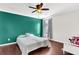 Bright bedroom with teal accent wall and ceiling fan at 108 Glenspring Dr, Summerville, SC 29486