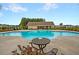 Community pool with a table and chairs at 108 Glenspring Dr, Summerville, SC 29486
