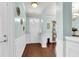 Bright entryway with hardwood floors and white door at 108 Glenspring Dr, Summerville, SC 29486