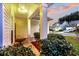 Small front porch with a table and chairs, offering a relaxing outdoor space at 108 Glenspring Dr, Summerville, SC 29486