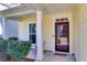 Small front porch with two metal chairs and a small table at 108 Glenspring Dr, Summerville, SC 29486