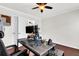 Home office space with hardwood floors, a large desk, and dual monitors at 108 Glenspring Dr, Summerville, SC 29486