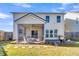 Exterior view of two-story house with screened porch at 108 Glenspring Dr, Summerville, SC 29486