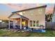 Back of house with screened porch, fire pit, and grill at 108 Glenspring Dr, Summerville, SC 29486