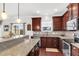Modern kitchen with granite countertops and stainless steel appliances at 108 Glenspring Dr, Summerville, SC 29486