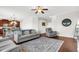 Living room with hardwood floors, comfortable seating, and open concept at 108 Glenspring Dr, Summerville, SC 29486