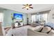 Spacious living room with hardwood floors, large TV, and comfy seating at 108 Glenspring Dr, Summerville, SC 29486