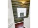 Stylish staircase features a wood accent wall and window at 108 Glenspring Dr, Summerville, SC 29486
