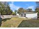 Backyard view showing a white house with green grass at 1132 Carter Ave, Mount Pleasant, SC 29464