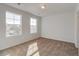 Bright bedroom with two large windows and neutral carpet at 122 O'Leary Cir, Summerville, SC 29483