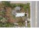 House with metal roof, situated on a corner lot at 1269 College Park Rd, Summerville, SC 29486