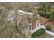 Aerial view of a house needing renovations, situated on a wooded lot at 1269 College Park Rd, Summerville, SC 29486