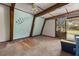 Primary bedroom with wood beams and sliding glass doors at 1269 College Park Rd, Summerville, SC 29486