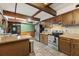 Kitchen with stainless steel appliances and wood cabinets at 1269 College Park Rd, Summerville, SC 29486