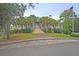 Community clubhouse with palm trees and flag, inviting entryway at 3164 Linksland Rd, Mount Pleasant,  29466