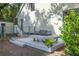 Relaxing backyard deck with metal chairs and a built-in bench at 3260 Cohen Hill Rd, Johns Island, SC 29455