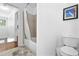 Bathroom with shower/tub combo, toilet, and window at 3260 Cohen Hill Rd, Johns Island, SC 29455