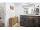 Bathroom with dark vanity and pebble flooring at 3260 Cohen Hill Rd, Johns Island, SC 29455