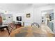 Open concept living and dining area with hardwood floors at 3260 Cohen Hill Rd, Johns Island, SC 29455