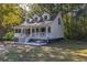 House exterior showcasing a front porch and landscaping at 3260 Cohen Hill Rd, Johns Island, SC 29455