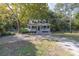 Charming one-story home with front porch and large tree at 3260 Cohen Hill Rd, Johns Island, SC 29455