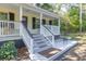 Front porch with gray steps and white railings at 3260 Cohen Hill Rd, Johns Island, SC 29455