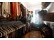 Walk-in closet with custom shelving and hanging rods at 3400 Henrietta Hartford Rd, Mount Pleasant, SC 29466