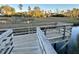 Wooden community dock extending over calm water with marsh views at 3400 Henrietta Hartford Rd, Mount Pleasant, SC 29466