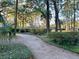 Paved path meanders through lush landscaping at 3400 Henrietta Hartford Rd, Mount Pleasant, SC 29466