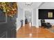 Bright entryway with hardwood floors and view to living room at 3400 Henrietta Hartford Rd, Mount Pleasant, SC 29466
