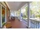 Front porch with white columns and view of neighborhood at 3400 Henrietta Hartford Rd, Mount Pleasant, SC 29466