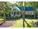 Charming two-story home with a welcoming front porch at 3400 Henrietta Hartford Rd, Mount Pleasant, SC 29466