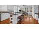 Kitchen with white cabinets, island, and breakfast area at 3400 Henrietta Hartford Rd, Mount Pleasant, SC 29466