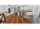 Eat-in kitchen with hardwood floors and a view of the staircase at 3400 Henrietta Hartford Rd, Mount Pleasant, SC 29466