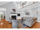 Spacious living room with hardwood floors, fireplace, and high ceilings at 3400 Henrietta Hartford Rd, Mount Pleasant, SC 29466