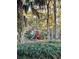 Wooden playground nestled among trees at 3400 Henrietta Hartford Rd, Mount Pleasant, SC 29466